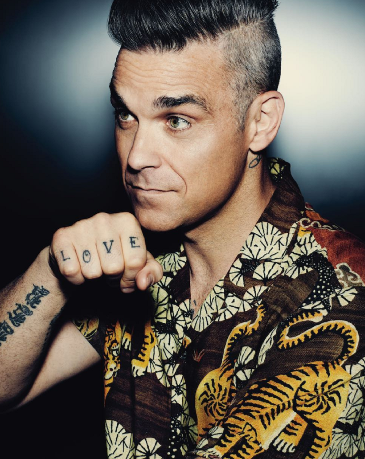 Robbie Williams, despullat per promocionar el seu nou disc