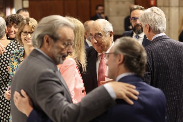 Jaume Giró y Quim Nadal al acabar la ceremonia deprisa de posesión de los nuevos consejeros|consellers Montse Giraltls nuevos consejeros|consellers Montse Giralt, J