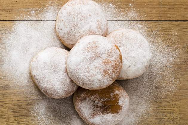 top view donuts with powdered sugar top